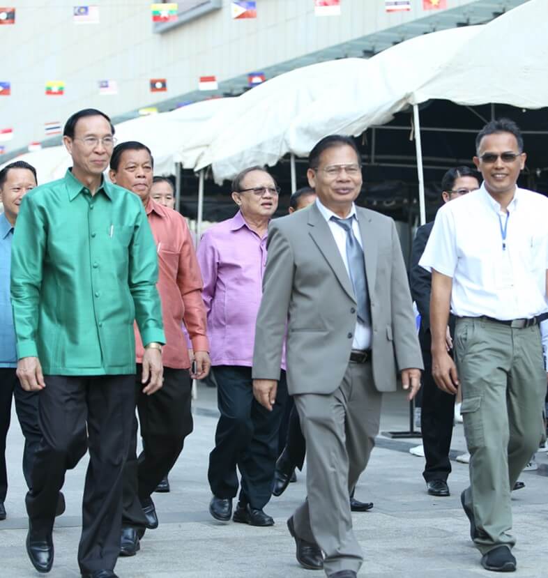 Officials walking through event