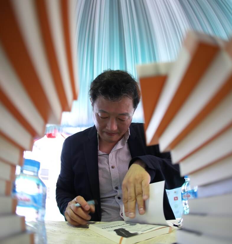 Person looking at books